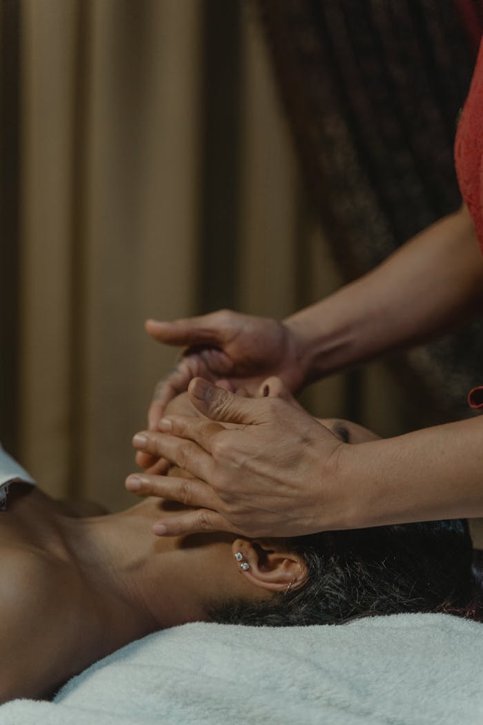 services-02 Experience ultimate relaxation with a calming facial massage in a tranquil spa setting.